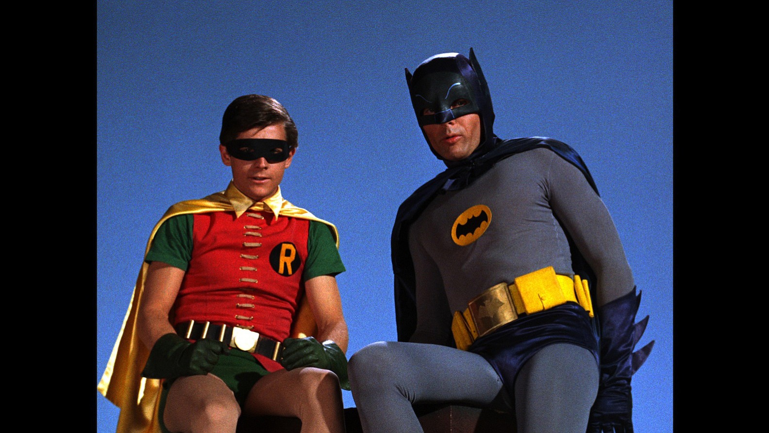 Adam West (as Batman in the '60s series) jokes that sidekick Burt Ward (as Robin) was quite the &quot;scene-stealer.&quot;