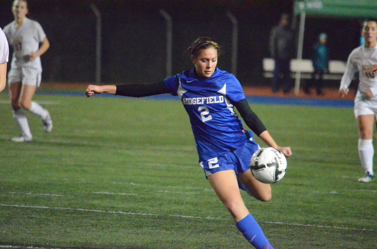 Ridgefield's Kara Klaus kicks the ball in a 2A state soccer semifinal match against Shorecrest on Friday in Shoreline.
