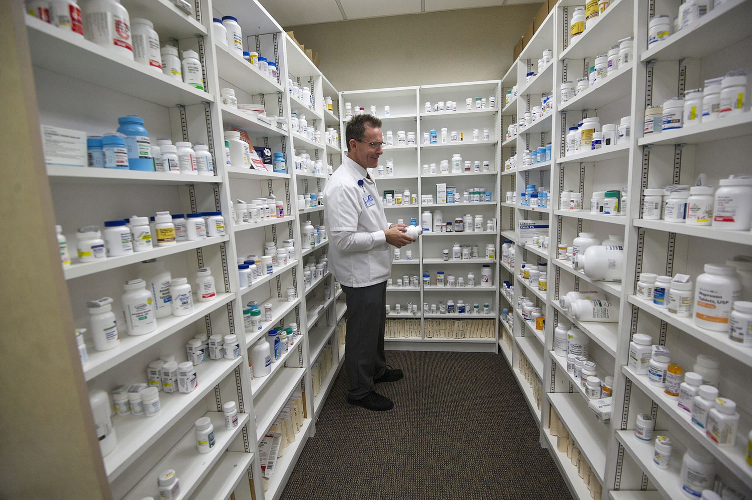 Pharmacist Patrick Gallaher works inside The Vancouver Clinic at Columbia Tech Center.