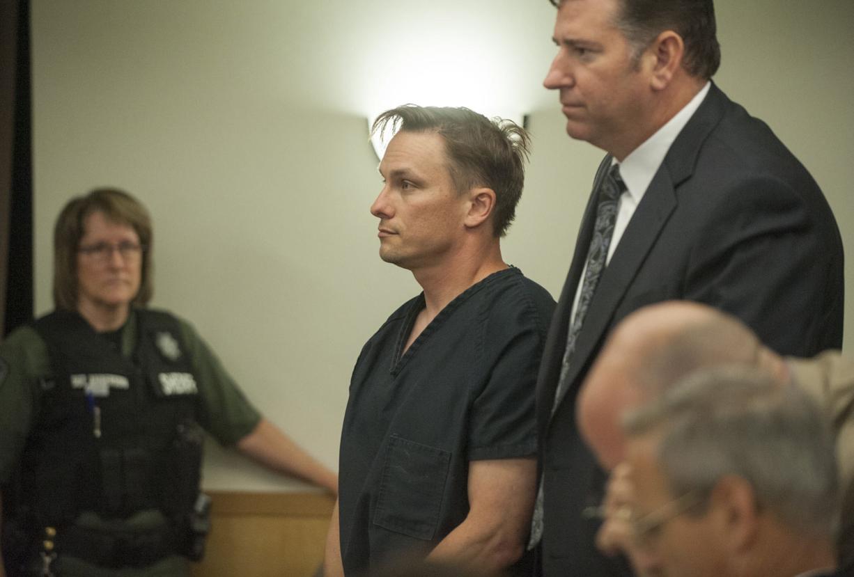 Evergreen High School science teacher Matthew Morasch, 40, makes a first appearance Tuesday in Clark County Superior Court on suspicion of two counts of voyeurism.