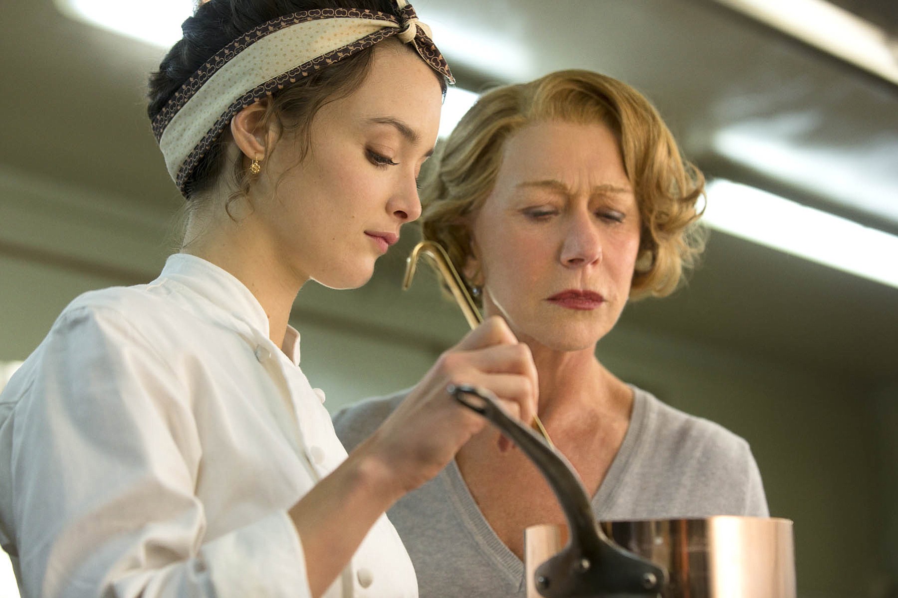 Charlotte Le Bon, left, as Marguerite and Helen Mirren, as Madame Mallory star in the rom-com-drama &quot;The Hundred-Foot Journey.&quot;