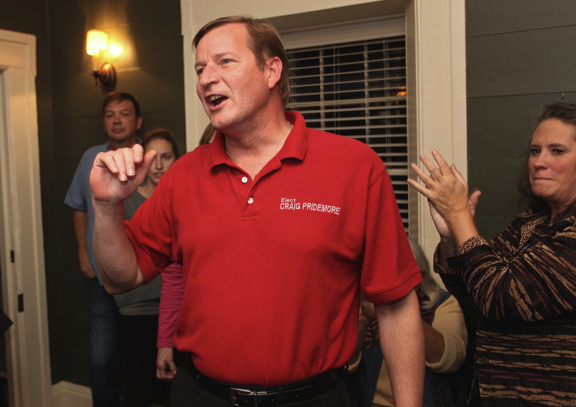 Steve Dipaola for The Columbian
Democrat Craig Pridemore and supporters react to early election results at the Grant House. After the first returns, Pridemore has a small lead over Republican Jeanne Stewart.
