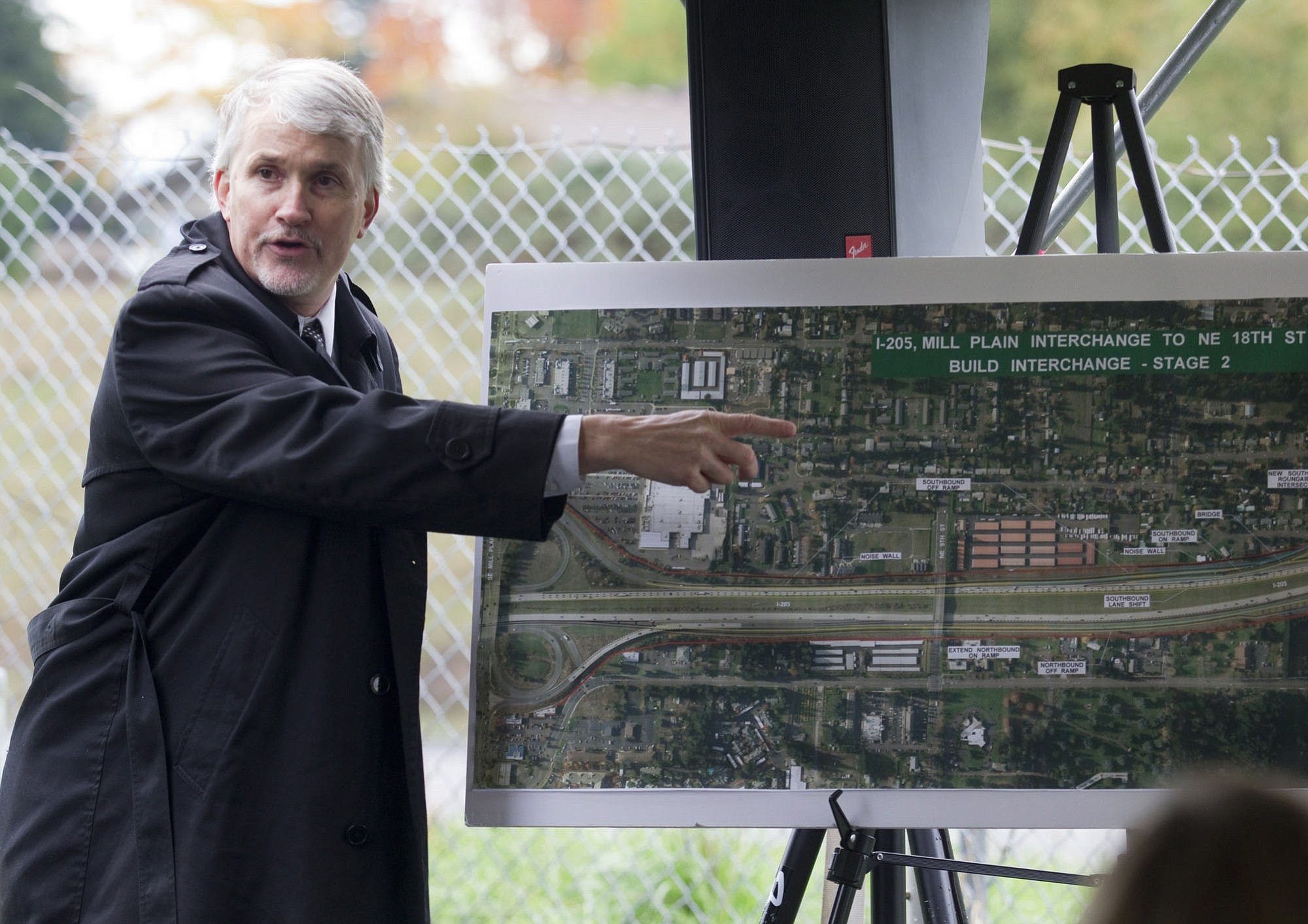 Bart Gernhart, an assistant regional administrator with the Washington State Department of Transportation, describes the features of a new interchange that will connect Interstate 205 and Northeast 18th Street.