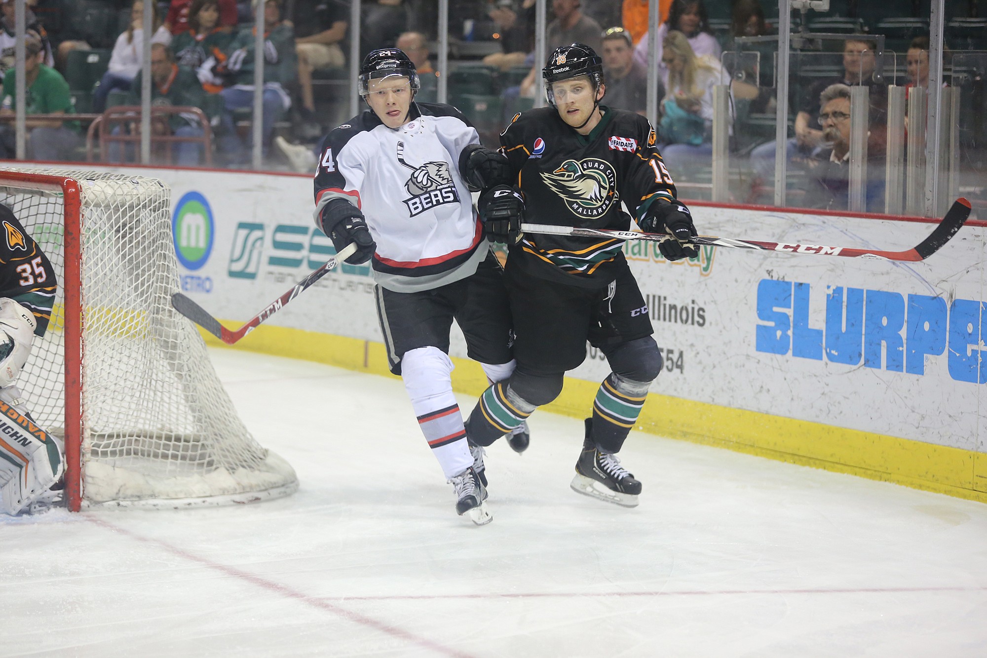 Austin Coldwell, right, played 19 games this spring with the Quad City Mallards of the East Coast Hockey League.