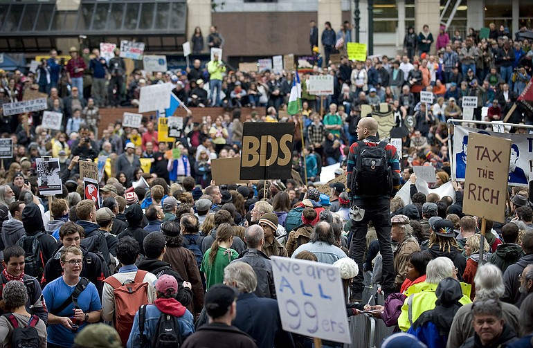 Protesters occupy Pioneer Square in downtown Portland in solidarity with the national protests against wall street bailouts and corporate greed on Thursday October 6, 2011.