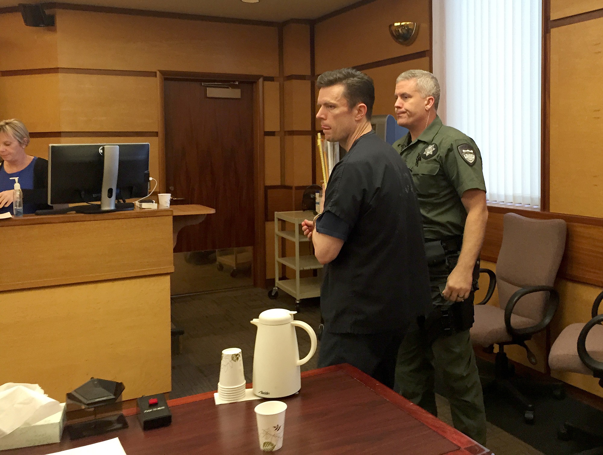 Paris Achen/The Columbian
John Garrett Smith is escorted out of a Clark County courtroom Wednesday after Superior Court Judge Robert Lewis found him guilty of second-degree attempted murder.