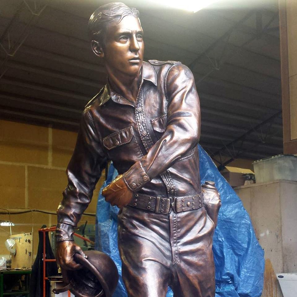 The finished bronze of World War II soldier Leonard DeWitt, created by Chad Caswell, was unveiled Sunday in downtown McMinnville, Ore.
