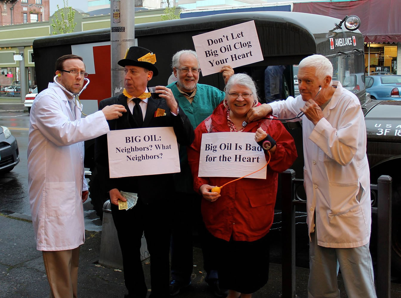 Courtesy photo
He's not a doctor, but he played one on Main Street. In April, the Rev. Brooks Berndt, left, and some members of his congregation brought anti-oil-train guerilla theater to downtown Vancouver.