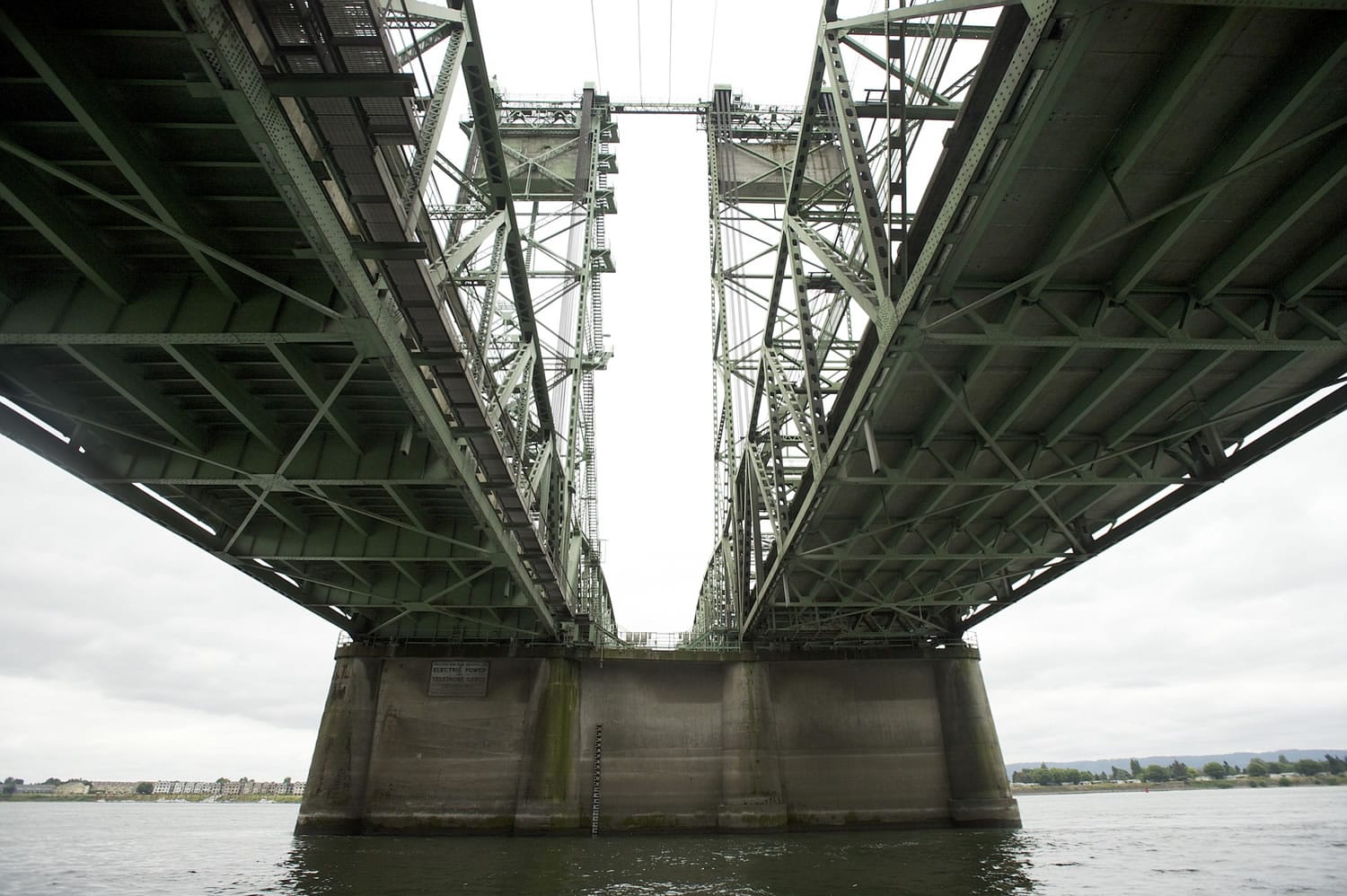 The current Interstate 5 Bridge, seen here looking toward the Oregon shore from under the lift span, is actually two bridges.