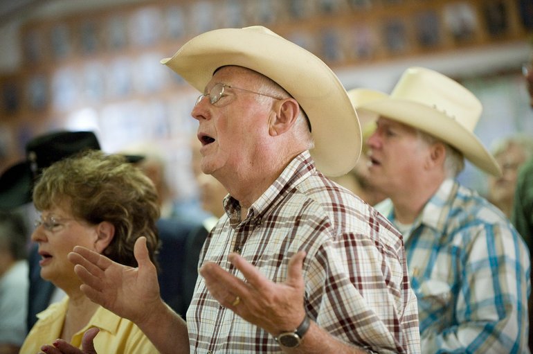Worshipers attend service at the Cowboy Church of Southwest Washington at the Manor Grange in Vancouver.