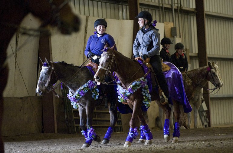 Courtney Miskell, left, and Megan Abelyn, seniors at La Center High School, wait to compete in the working pairs event Saturday at the Washington High School Equestrian Teams competition at the Clark County Event Center at the Fairgrounds.