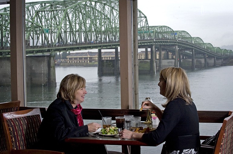 Plans to replace the Interstate 5 Bridge could jeopardize The Quay Restaurant &amp; Bar, which this month celebrates its 50th year of serving patrons like Kelli Osler, left, and Sonya Langsdorf.