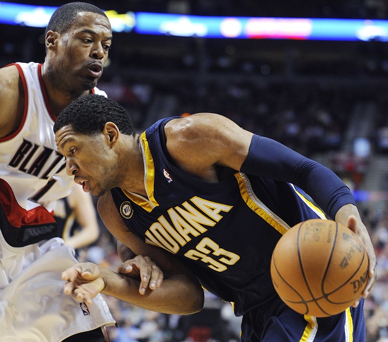 Indiana Pacers' Danny Granger (33) drives against Portland Trail Blazers' Marcus Canby, left, during the first half of an NBA basketball game in Portland, Ore., Wednesday March 3, 2010.
