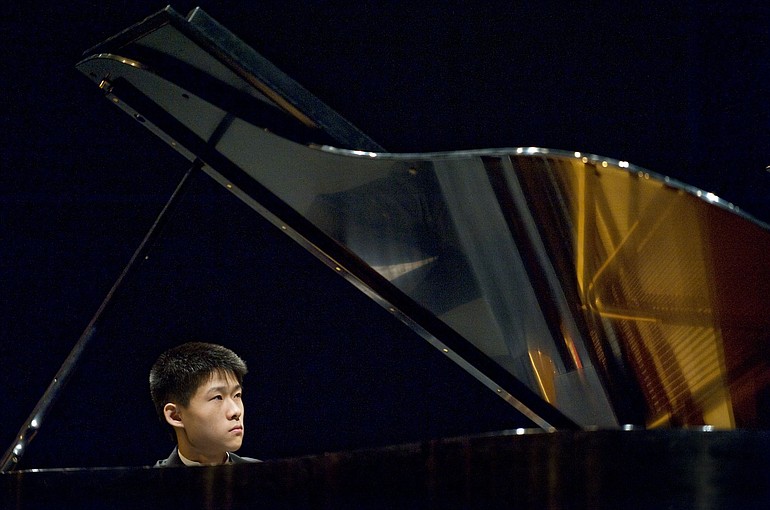 Fred Lu, 16, of Skyview High School performs Rachmaninoff on Sunday at the Vancouver Symphony Orchestra's 16th Annual Young Artists Competition.