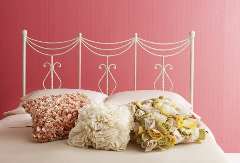 Ruffle pillows in soft new hues.