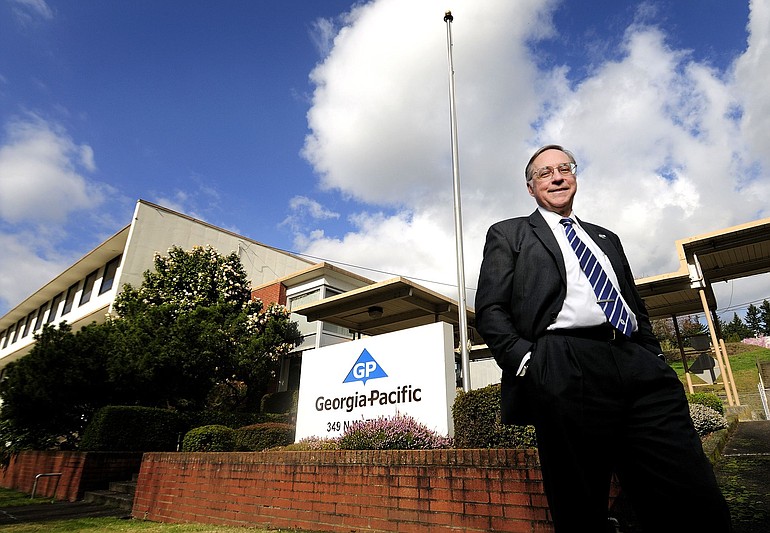 Bill Connelly, a vice president and broker with Vancouver-based Eric Fuller &amp; Associates Inc., stands outside a vacant Georgia-Pacific office in Camas.