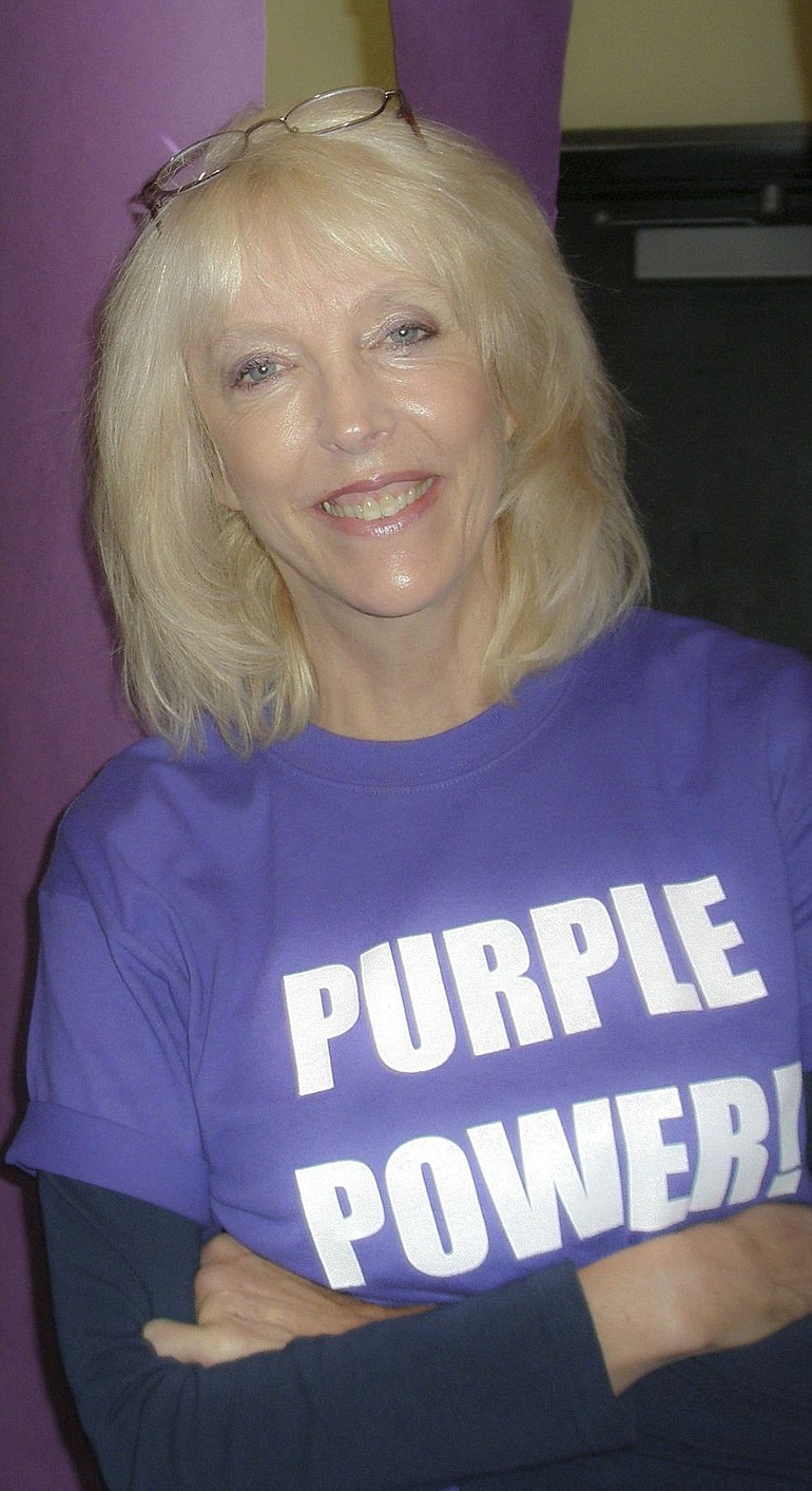 Candace &quot;Candy&quot; Morrison, along with her colleagues, wore purple, the teacher's designated color, during Hudson's Bay High School's color wars.