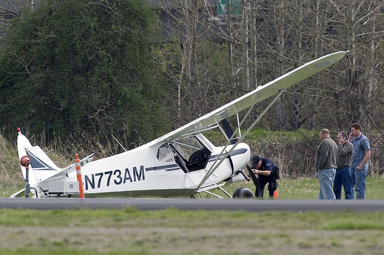 A gear failure caused pilot Mike Curtin of Clark County to come to a skidding stop about 1:30 p.m. today at Pearson Field. Curtin and his passenger walked away uninjured.