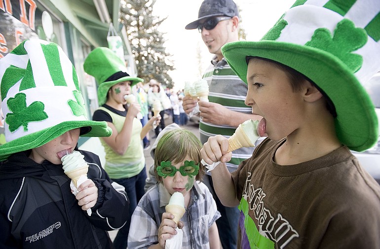 Ryan Banks, 10, from left, Taylor Shier, 13, Daniel Hansen, 7, Shea Hansen and Bradley Shier, 11, eat free mint ice cream cones at O'Brady's Drive-In on St. Patrick's Day. For decades, the Dollars Corner restaurant has given away cones.