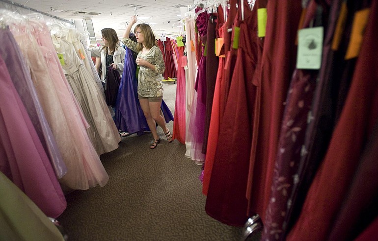 Kysa Sedivy, 17, a junior at Skyview High School, was one of hundreds of girls sifting through thousands of dresses during Operation Fairy Godmother at the Westfield Vancouver Mall.