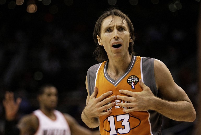 Phoenix Suns guard Steve Nash reacts to a foul call against him against the Portland Trail Blazers during the first half of an NBA basketball game Sunday, March 21, 2010, in Phoenix.