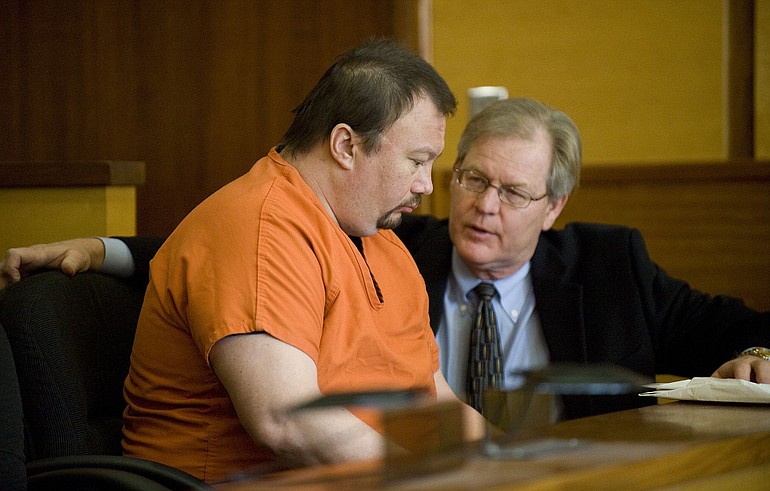Michael Schuurmans, talking with attorney Tom Phelan during a hearing in Judge Robert Lewis' courtroom, Monday, March 22, 2010, will be commited to Western State Hospital for the 2009 killing of his sister.
