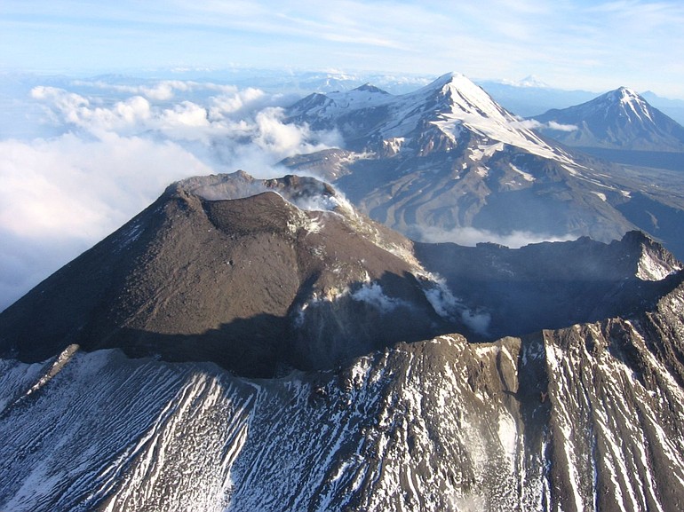Bezymianny volcano in Russia, photo taken August 2005. This volcano on Russia's Kamchatka peninsula had a major eruption in 1956 and looks a lot like Mount St. Helens in the way it's rebuilding itself. Scientists are studying it for clues to St. Helens' future.