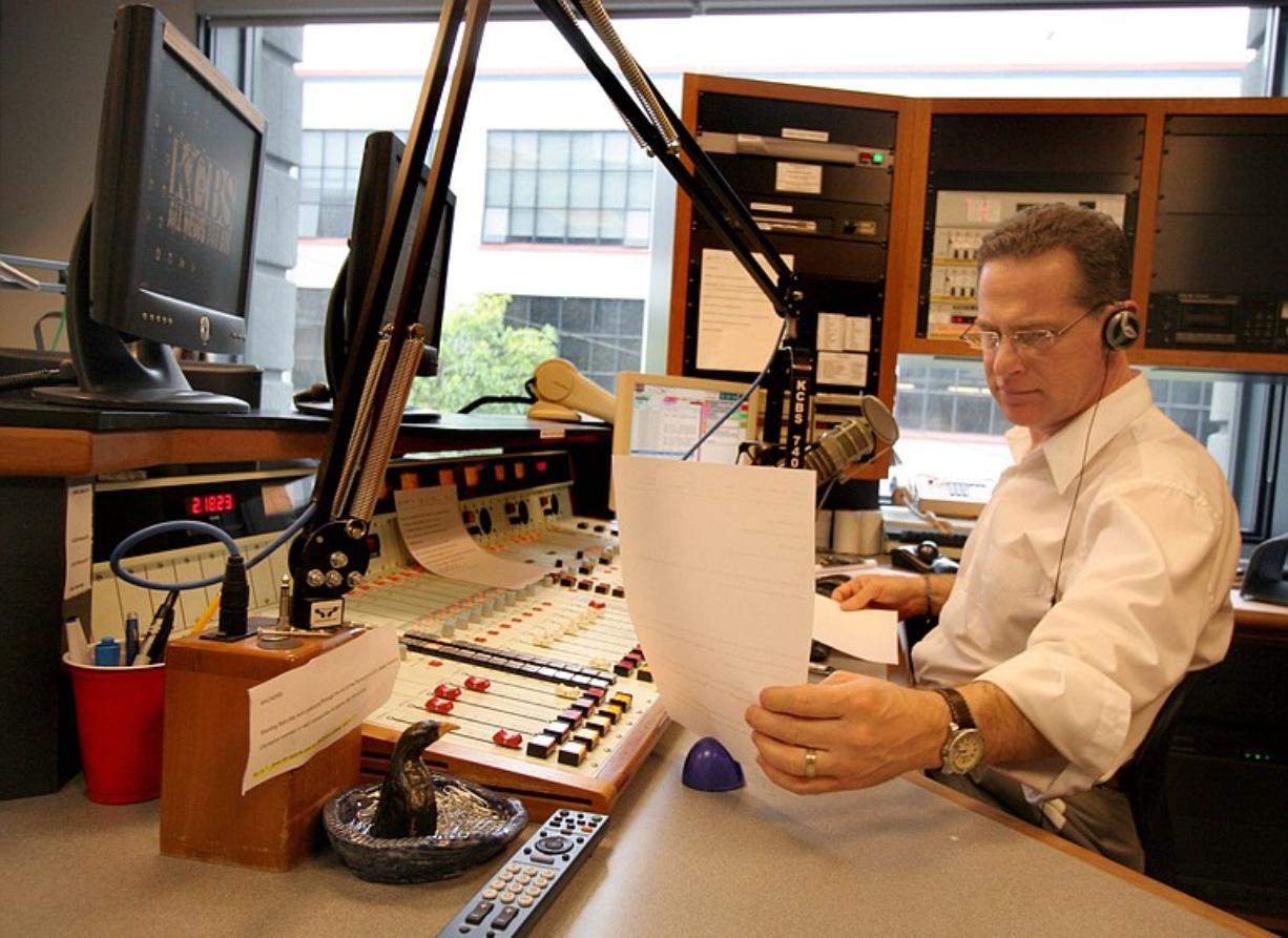 KCBS radio news anchor Jeff Bell reads news updates during a broadcast at the news studio in San Francisco.