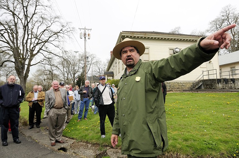 National Park Service archaeologist Bob Cromwell points out a spot at the Vancouver Barracks during a walking tour Wednesday.