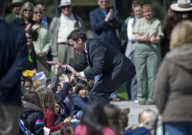 Vancouver Mayor Tim Leavitt gave schoolchildren a high-five and asked for help planting his tree in the Mayor's Grove.