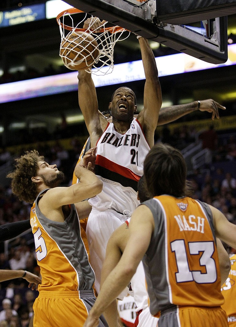 Marcus Camby (21) was acquired during the season to give the Blazers a presence in the middle.