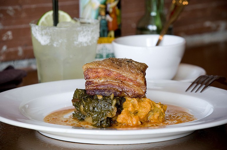 Puerco is one of the specialties at Nuestra Mesa. The centerpiece of the dish is a slow-roasted Carlton Farms pork belly.
