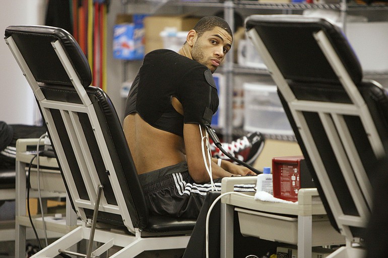 Portland Trail Blazers Nicolas Batum, of France, recieves treatment for his shoulder during basketball practice Wednesday, April 21, 2010, in Tualatin, Ore.