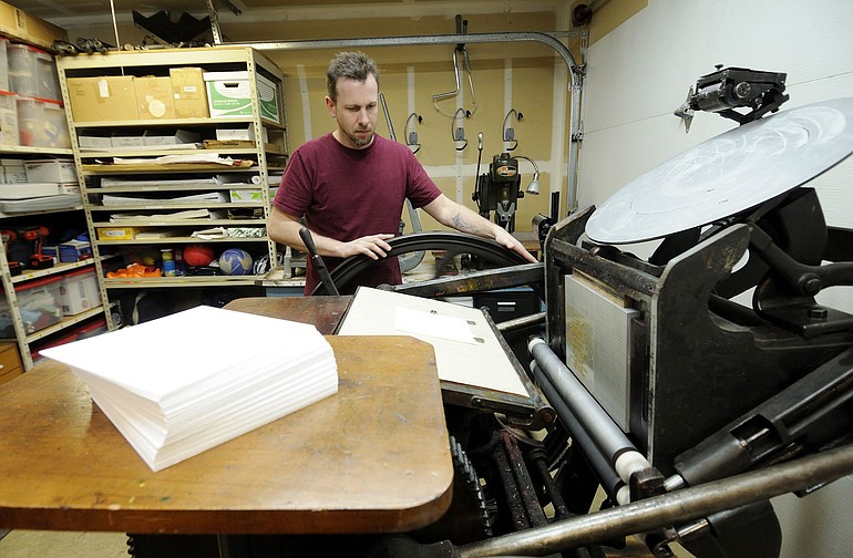 Kevin Cox, owner of Jazyrain Letterpress Stationer, uses a printing press made in 1896.