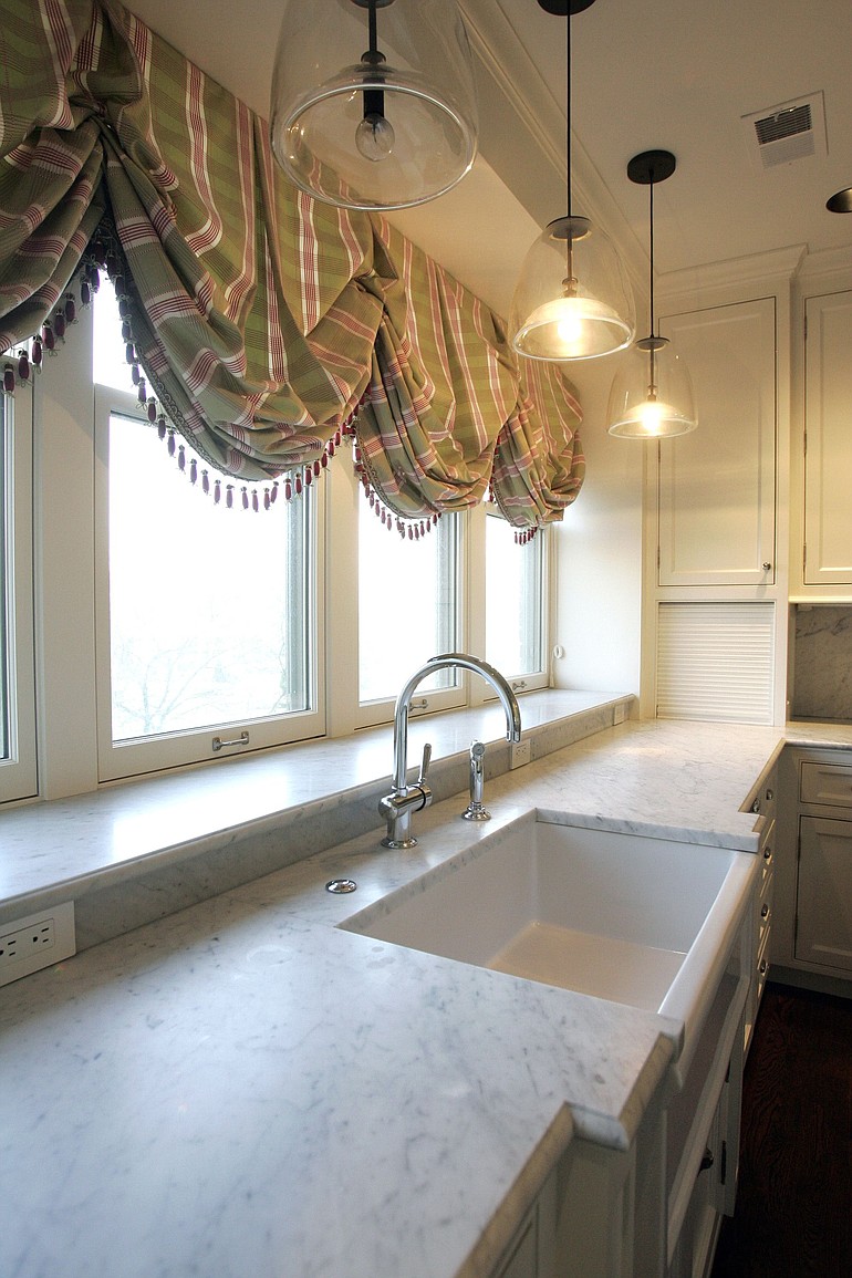 Carrara marble works as well in the kitchen as it does in the bath.