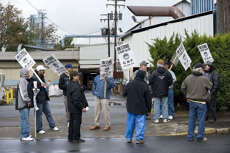 Steel workers strike outside Vancouver Iron and Steel Inc.