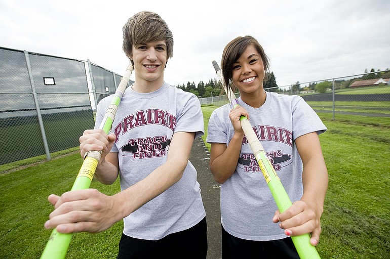 Prairie High School pole vaulters Blake Bier and Kristina Owsinski at practice, Tuesday, May 11, 2010.