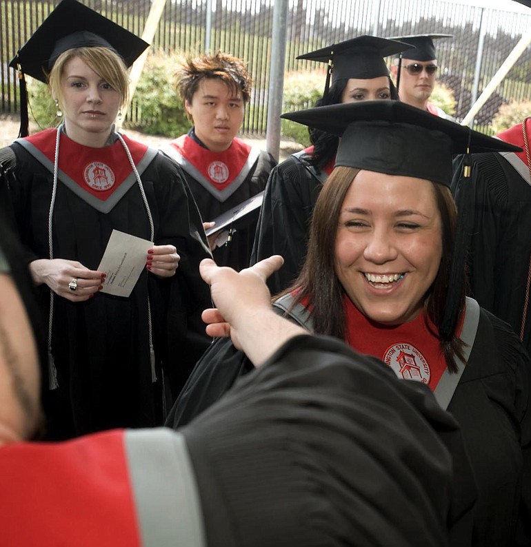 Nicole Mousleh (center), who graduated from WSU Vancouver with the first freshman class Saturday, says the arrival of freshmen and sophomores on campus in 2006 boosted student involvement.