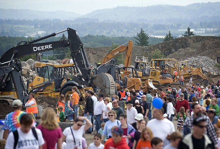 Crowds get a close look at heavy equipment at the Cemex-Fisher Quarry on Sunday.