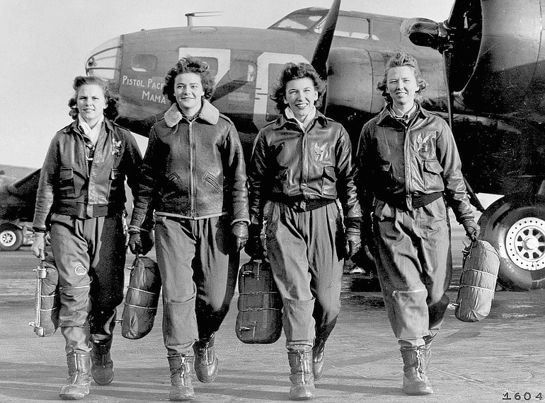Four pilots -- Frances Green, from left, Margaret Kirchner, Ann Waldner and Vancouver's Blanche Osborn Bross -- walk away from their plane after a training flight at the Army Air Force base at Lockbourne, Ohio.
