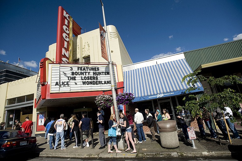 Moviegoers lined up Monday outside Kiggins Theater on Main Street in downtown Vancouver for the theater's final night.