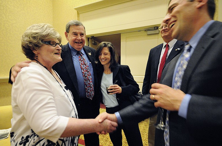 Former Vancouver Mayor Royce Pollard, center, enjoys a laugh with wife Margaret Pollard, left, Andy Nygard, right, and Andy's wife Cheree Nygard.