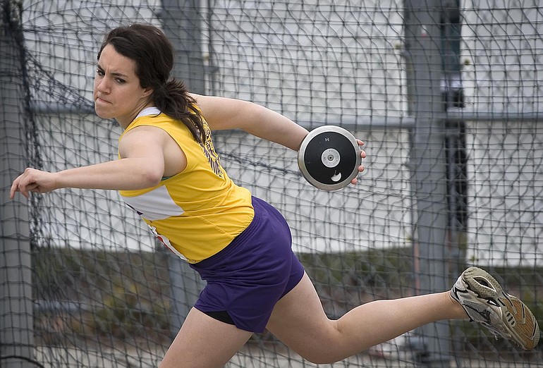 Columbia River's Anna Adamko throws her way to a state 3A title in discus.