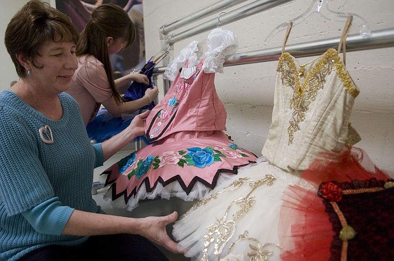 Brenda Smith, left, and her daughter, Nicole Smith, look through a few of the tutus Brenda has made for students at Columbia Dance in Vancouver over the past five years.