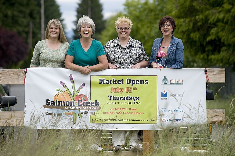 Becky Gyes, from left, Ann Foster, Anna Petruolo and Chris Bennett helped organize the new Salmon Creek Farmers' Market near Northeast 139th Street.