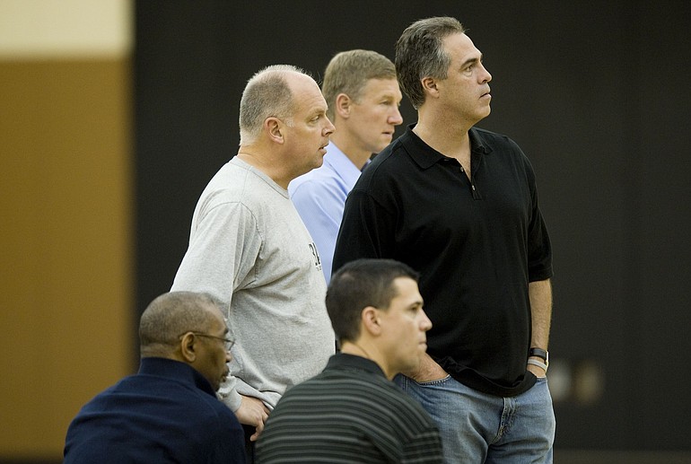 Portland Trail Blazers general manager Kevin Pritchard, right, watched a rookie workout with (from left) team president Larry Miller, trainer Jay Jensen, and player scouts Michael Born and Chad Buchanan (sitting).