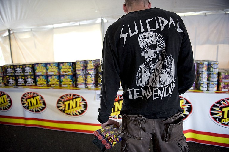 Renne Carter, 41, of Portland made the trip across the Columbia River to buy fireworks at the TNT Fireworks booth in 2010.