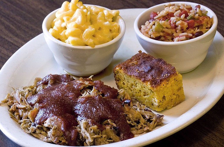 Pig Heaven Barbecue's pulled pork platter comes with mac 'n' cheese, red beans and rice, corn bread and a drink.