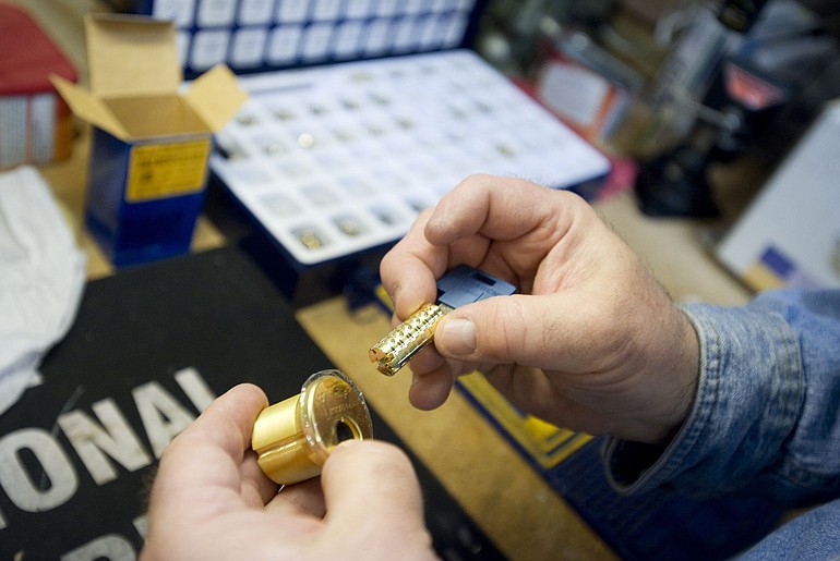 Richard Corvi works on a 10-pin high-security mortise lock.