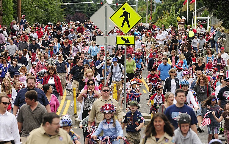 Family and neighbors walk down N.W. 36th Avenue during the annual Felida Fourth of July community parade.